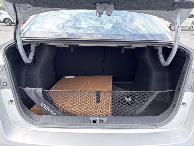 2025 Brilliant Silver Metallic Nissan Versa 1.6 S FWD Sedan