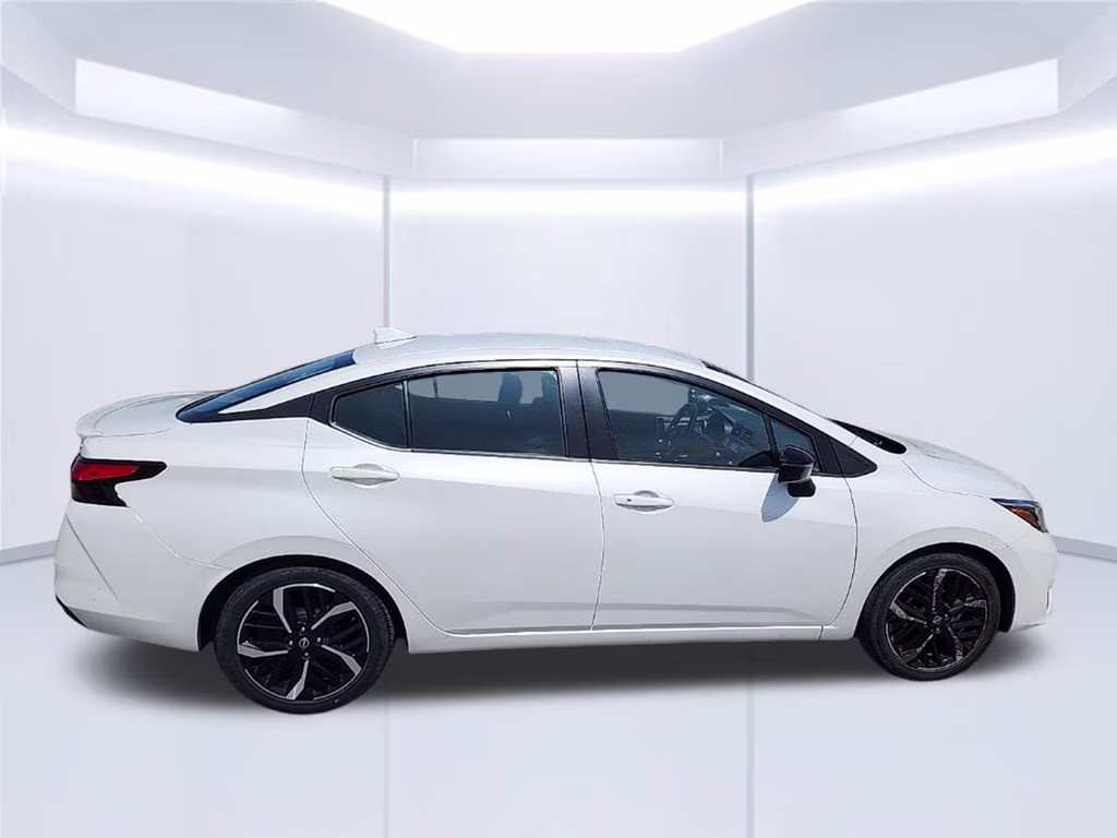 2024 Aspen White Tricoat Nissan Versa 1.6 SR FWD Sedan
