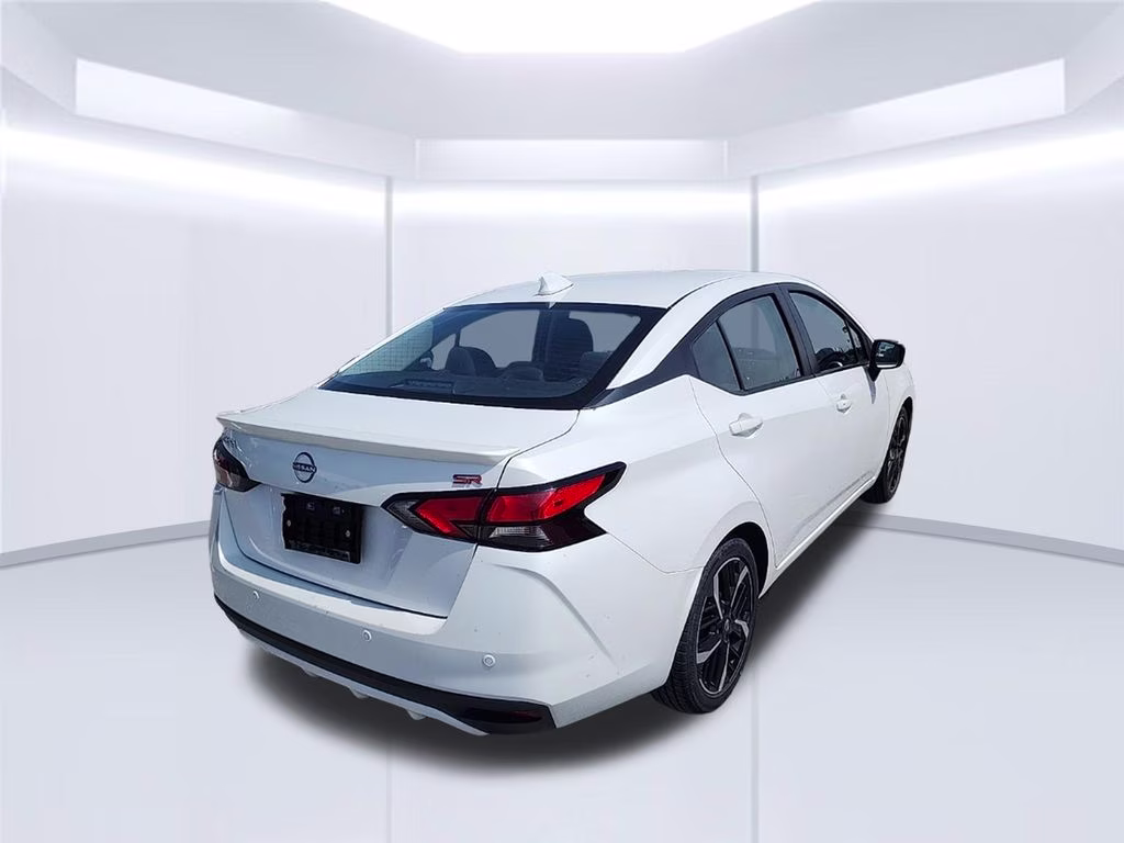 2024 Aspen White Tricoat Nissan Versa 1.6 SR FWD Sedan