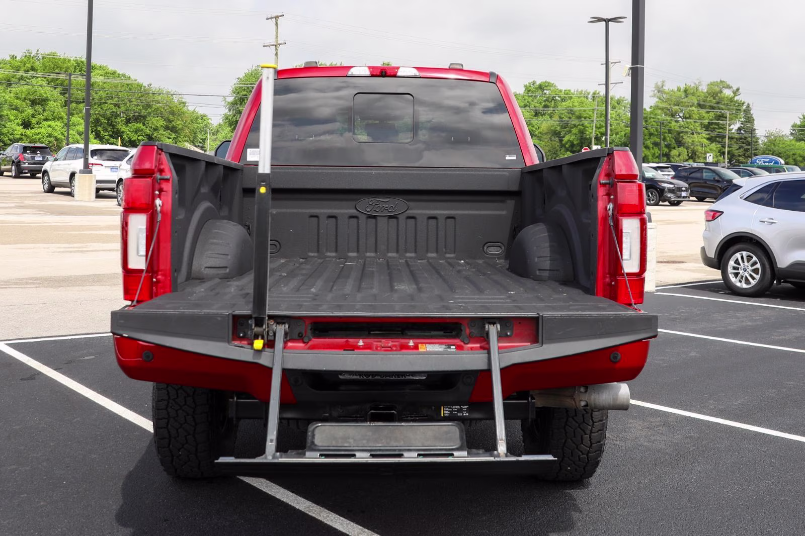 2021 Rapid Red Metallic Tinted Clearcoat Ford Super Duty F-250 SRW Lariat 4X4 Truck