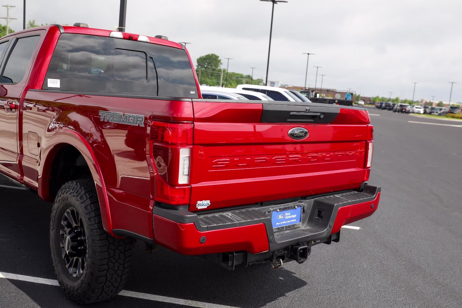 2021 Rapid Red Metallic Tinted Clearcoat Ford Super Duty F-250 SRW Lariat 4X4 Truck