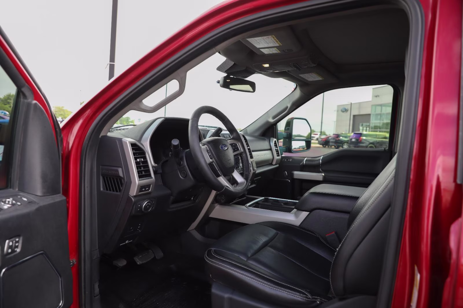 2021 Rapid Red Metallic Tinted Clearcoat Ford Super Duty F-250 SRW Lariat 4X4 Truck