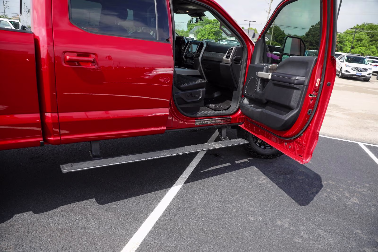 2021 Rapid Red Metallic Tinted Clearcoat Ford Super Duty F-250 SRW Lariat 4X4 Truck