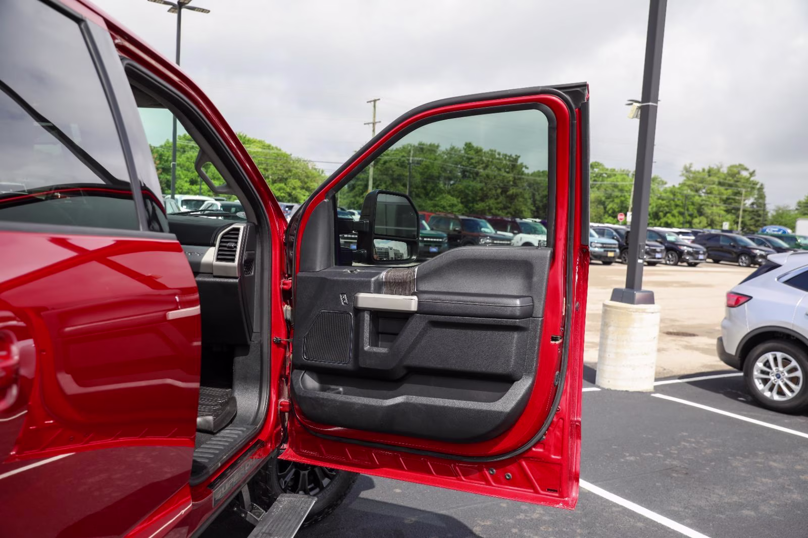 2021 Rapid Red Metallic Tinted Clearcoat Ford Super Duty F-250 SRW Lariat 4X4 Truck