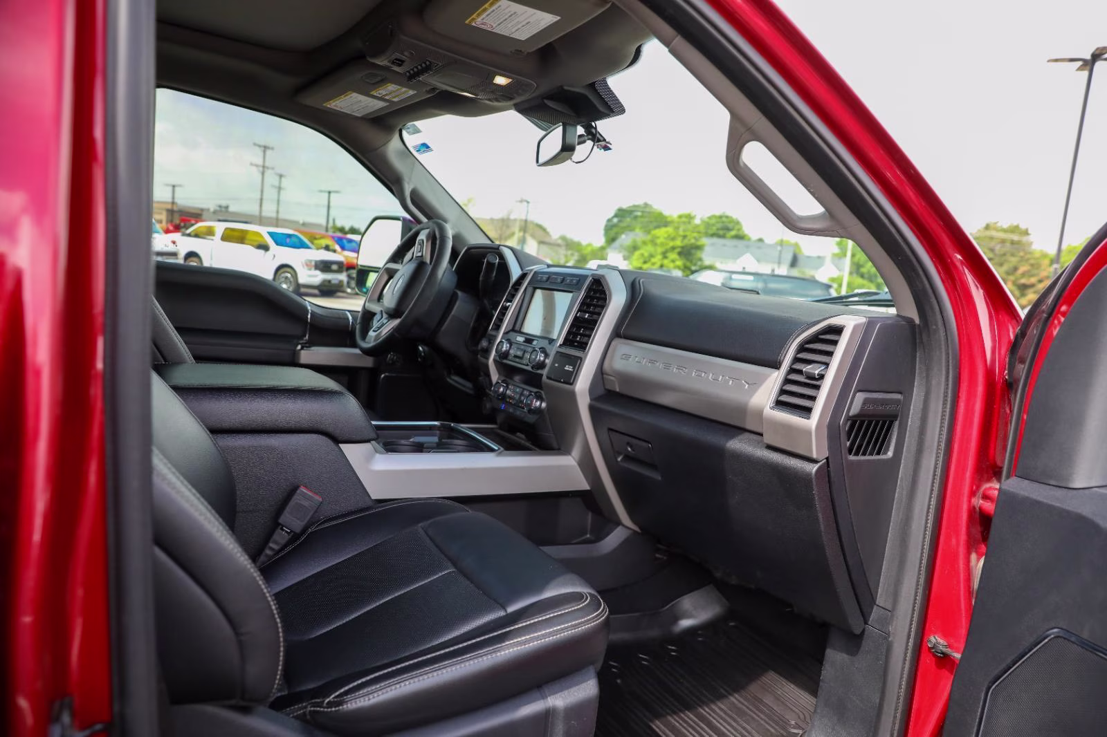 2021 Rapid Red Metallic Tinted Clearcoat Ford Super Duty F-250 SRW Lariat 4X4 Truck