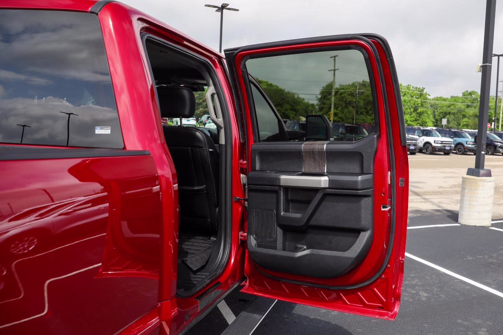 2021 Rapid Red Metallic Tinted Clearcoat Ford Super Duty F-250 SRW Lariat 4X4 Truck