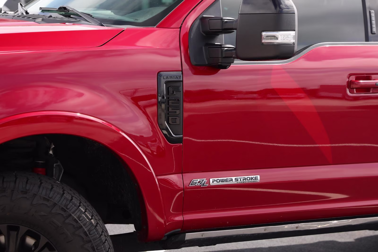 2021 Rapid Red Metallic Tinted Clearcoat Ford Super Duty F-250 SRW Lariat 4X4 Truck