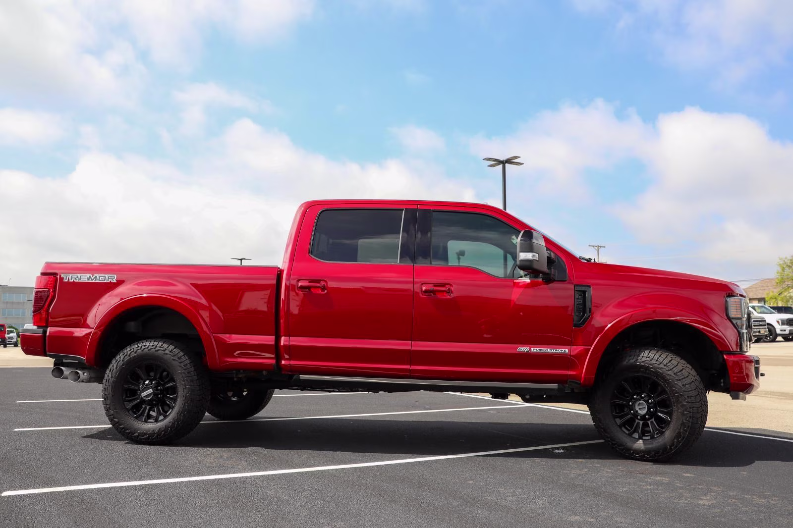 2021 Rapid Red Metallic Tinted Clearcoat Ford Super Duty F-250 SRW Lariat 4X4 Truck
