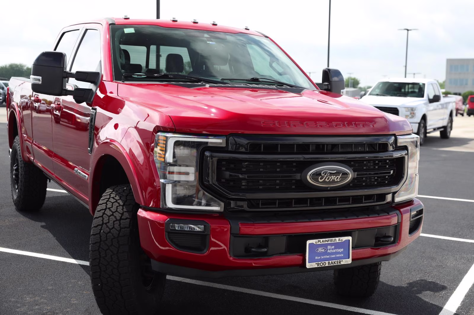 2021 Rapid Red Metallic Tinted Clearcoat Ford Super Duty F-250 SRW Lariat 4X4 Truck