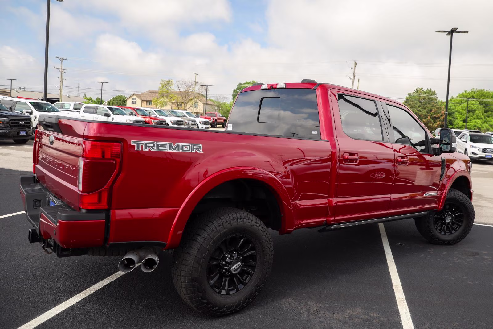 2021 Rapid Red Metallic Tinted Clearcoat Ford Super Duty F-250 SRW Lariat 4X4 Truck