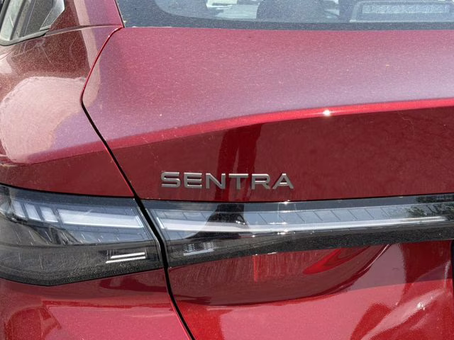 2026 Scarlet Ember Tintcoat Nissan Sentra SV FWD Sedan