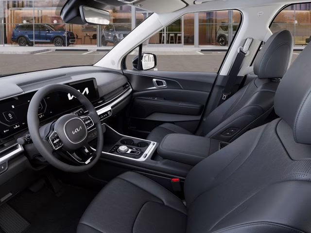 2026 Astra Blue Kia Carnival Hybrid SX FWD Van