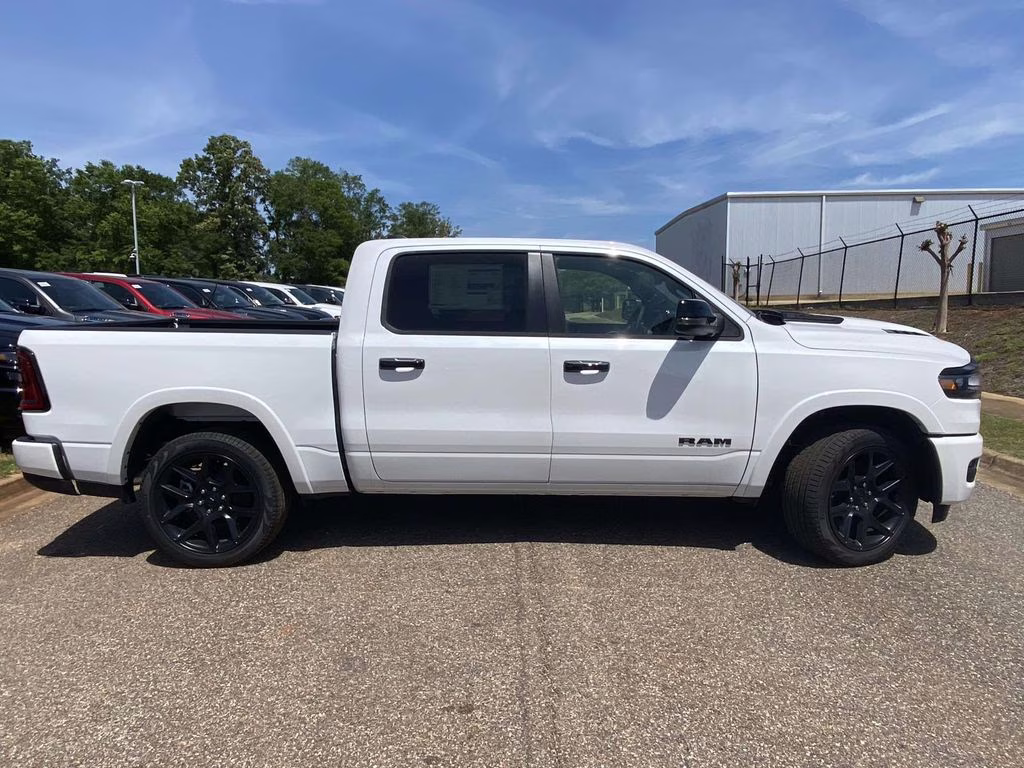 2026 Ivory White Tri-Coat Pearlcoat Ram 1500 Laramie 4X4 Truck