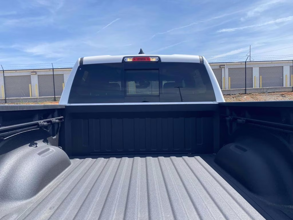 2026 Ivory White Tri-Coat Pearlcoat Ram 1500 Laramie 4X4 Truck