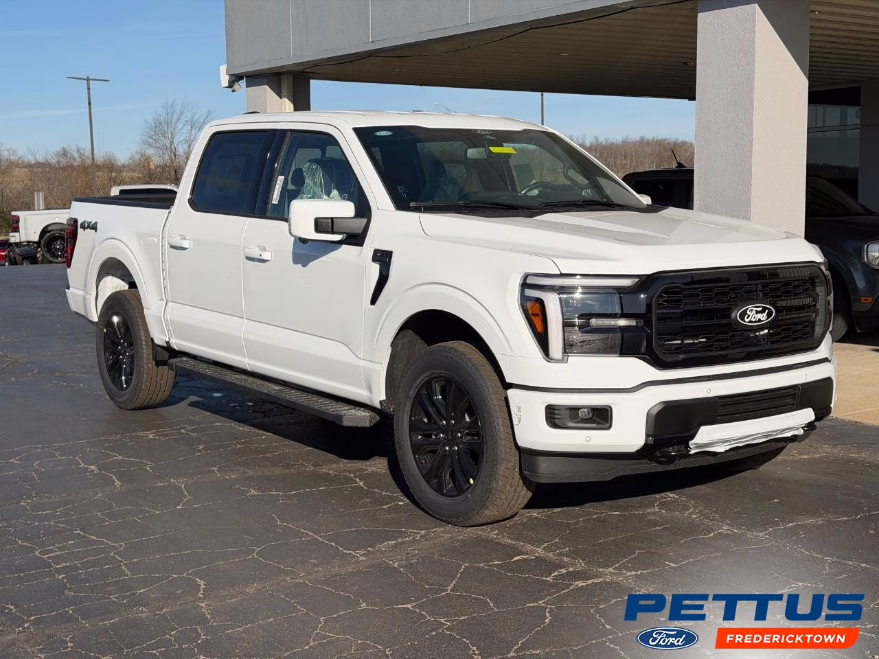 2026 Star White Metallic Tri-Coat Ford F-150 Lariat 4X4 Truck