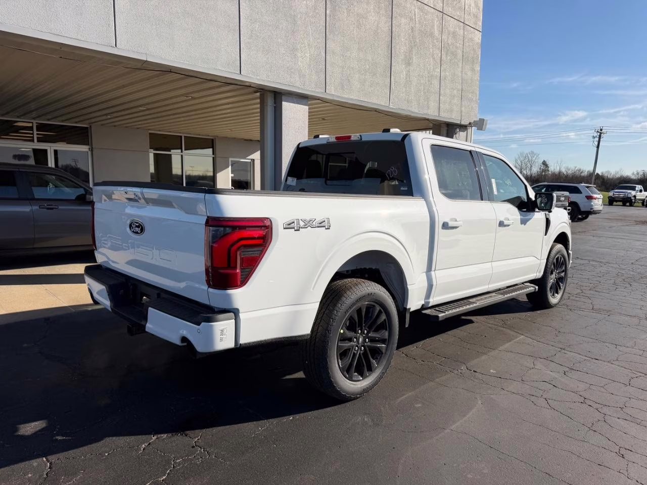 2026 Star White Metallic Tri-Coat Ford F-150 Lariat 4X4 Truck