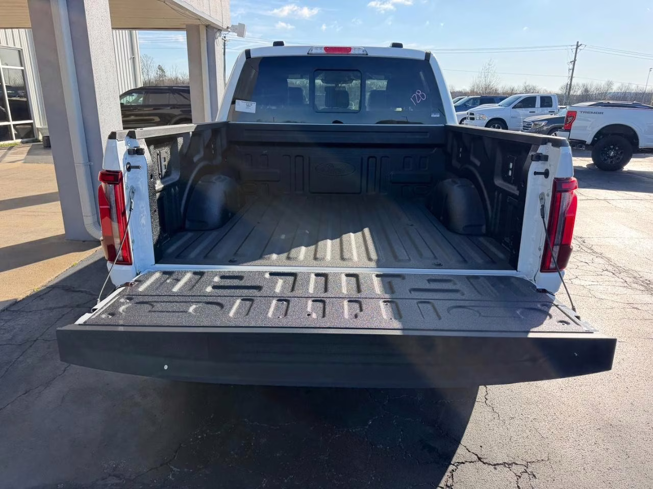 2026 Star White Metallic Tri-Coat Ford F-150 Lariat 4X4 Truck