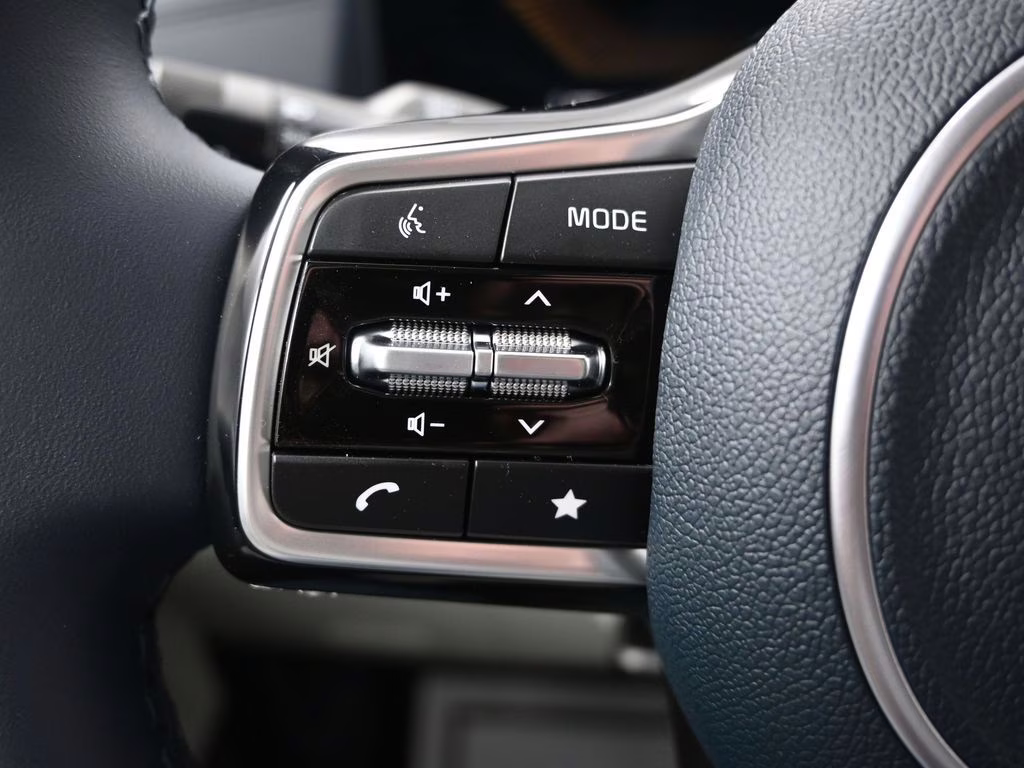 2026 Ceramic Silver Kia Carnival EX FWD Van