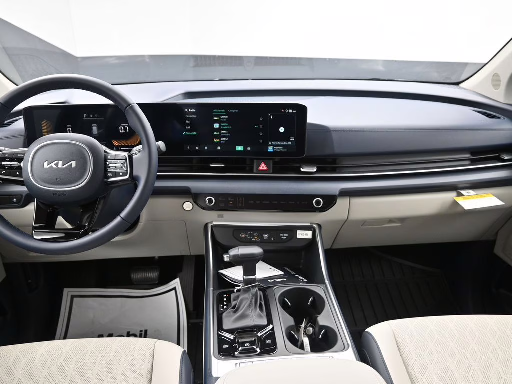 2026 Ceramic Silver Kia Carnival EX FWD Van