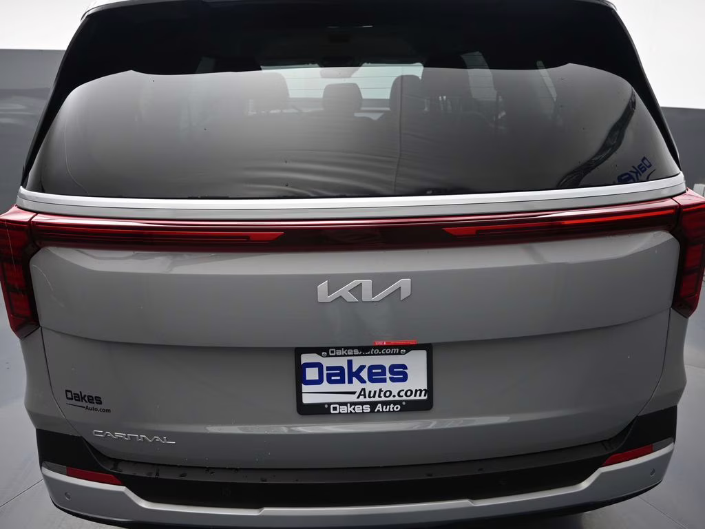 2026 Ceramic Silver Kia Carnival EX FWD Van