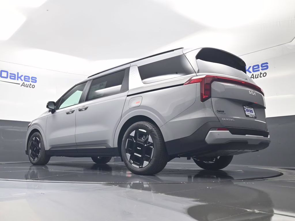 2026 Ceramic Silver Kia Carnival EX FWD Van