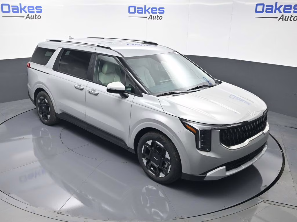 2026 Ceramic Silver Kia Carnival EX FWD Van