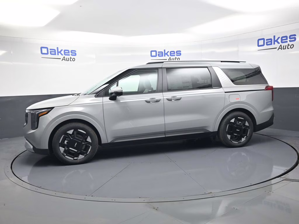 2026 Ceramic Silver Kia Carnival EX FWD Van