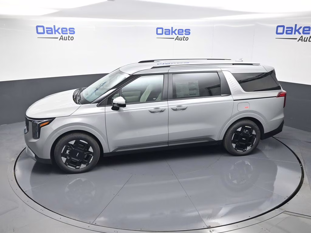 2026 Ceramic Silver Kia Carnival EX FWD Van