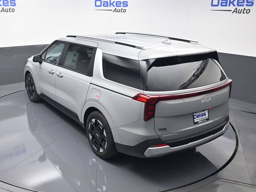 2026 Ceramic Silver Kia Carnival EX FWD Van