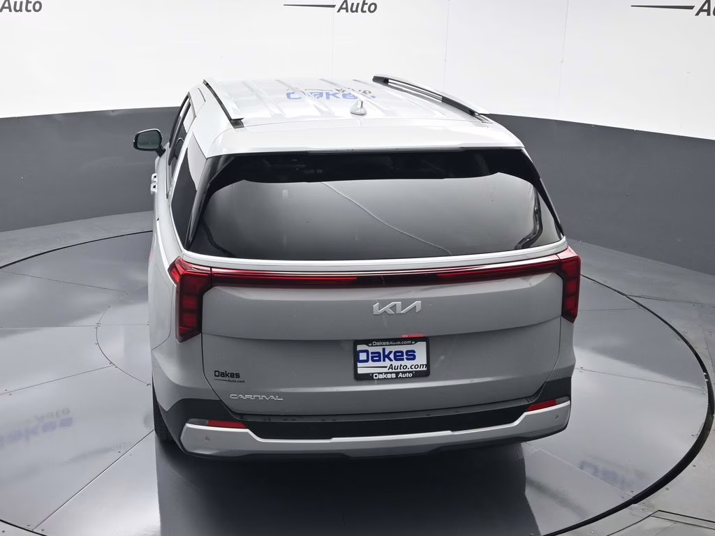 2026 Ceramic Silver Kia Carnival EX FWD Van