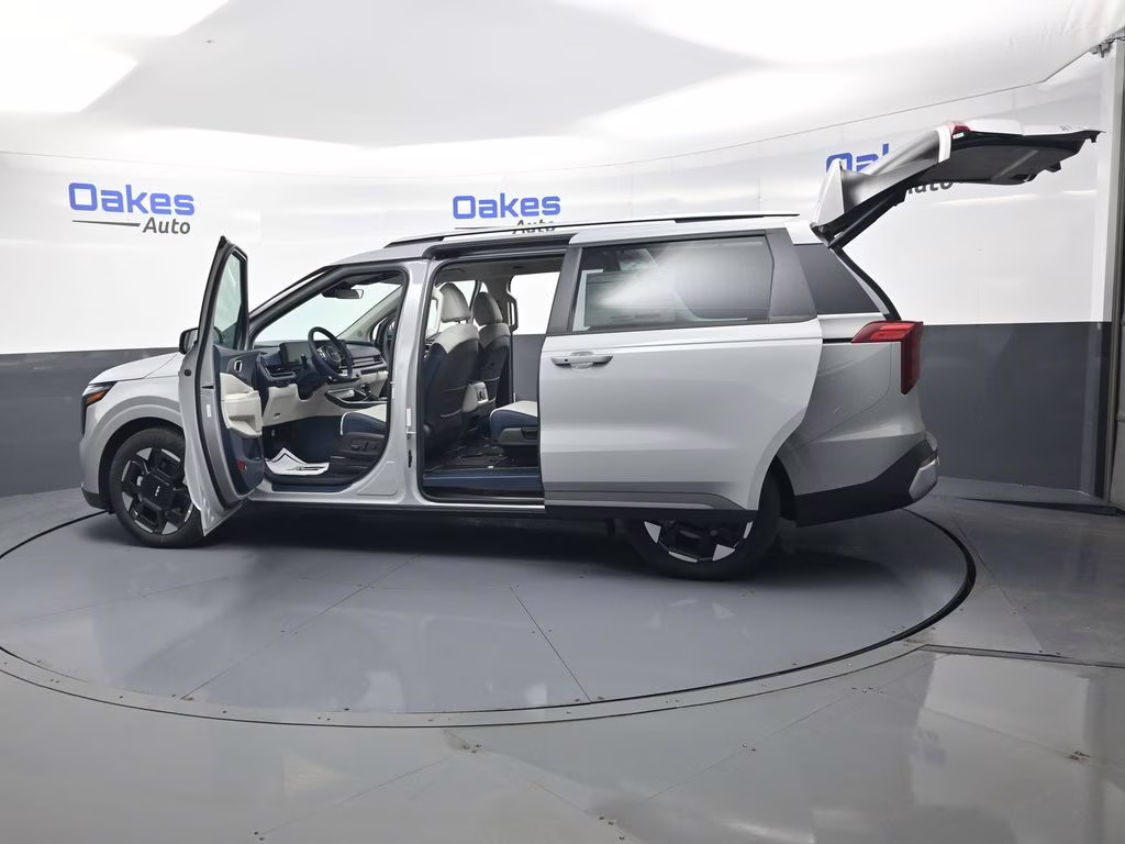 2026 Ceramic Silver Kia Carnival EX FWD Van