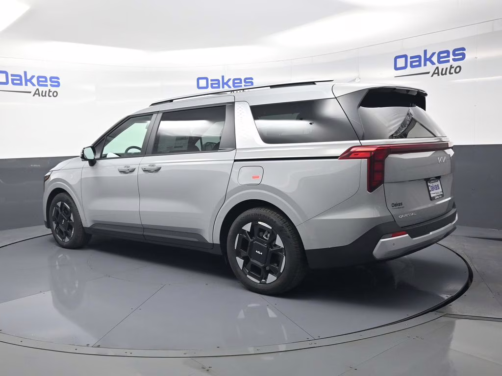 2026 Ceramic Silver Kia Carnival EX FWD Van
