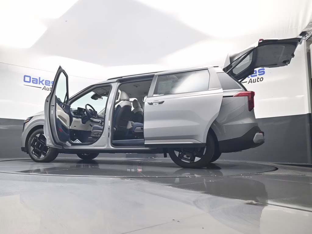 2026 Ceramic Silver Kia Carnival EX FWD Van