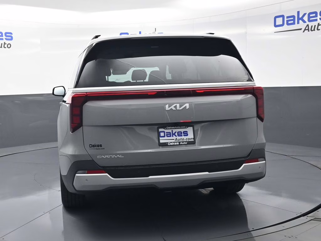 2026 Ceramic Silver Kia Carnival EX FWD Van