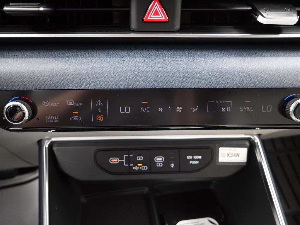 2026 Ceramic Silver Kia Carnival EX FWD Van