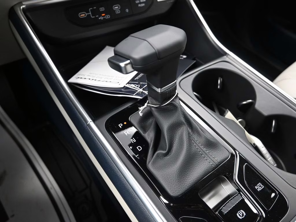 2026 Ceramic Silver Kia Carnival EX FWD Van