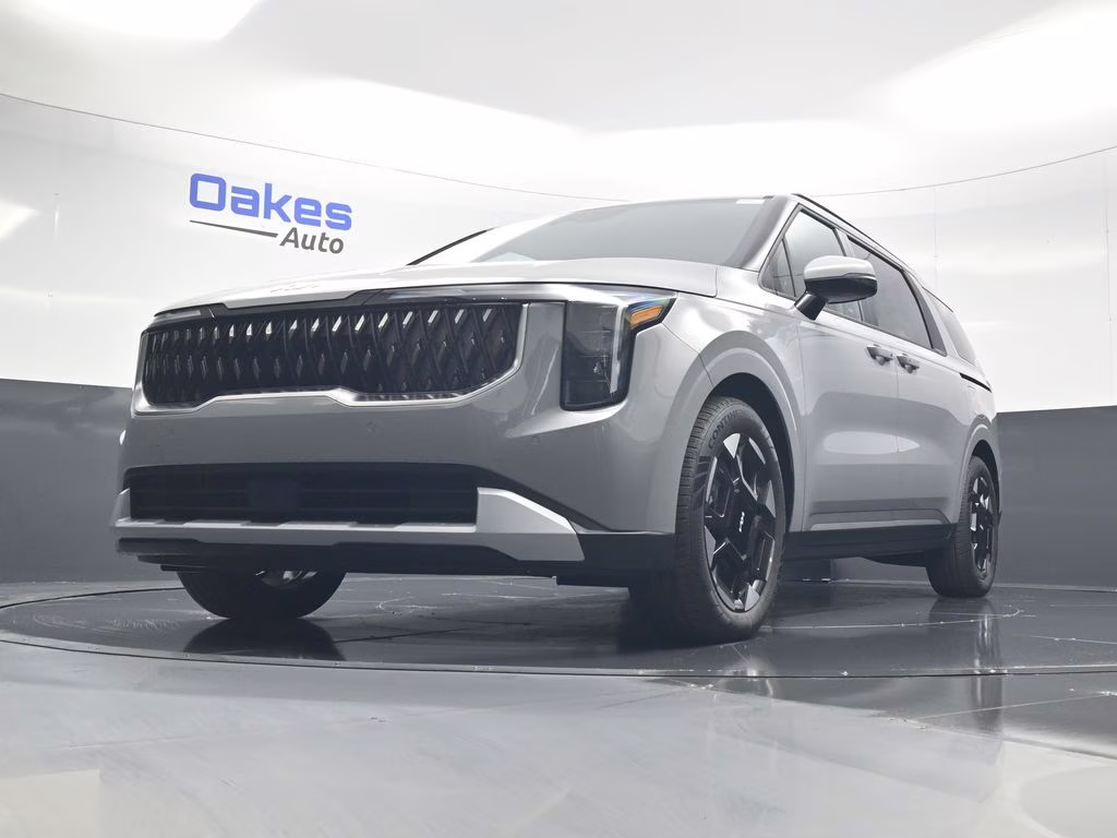 2026 Ceramic Silver Kia Carnival EX FWD Van