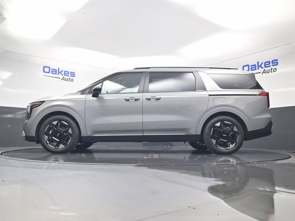 2026 Ceramic Silver Kia Carnival EX FWD Van