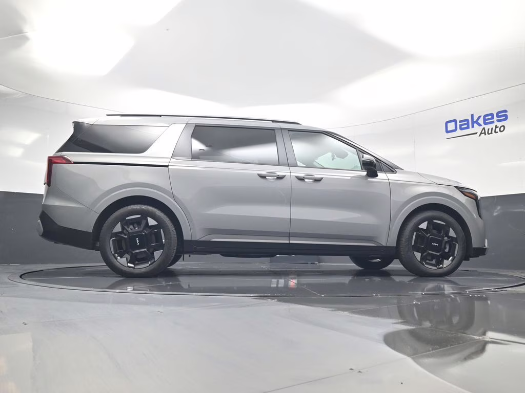 2026 Ceramic Silver Kia Carnival EX FWD Van
