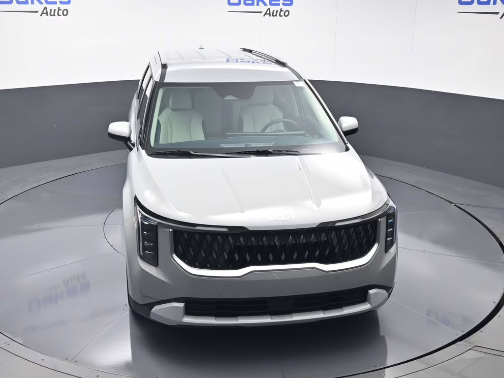 2026 Ceramic Silver Kia Carnival EX FWD Van