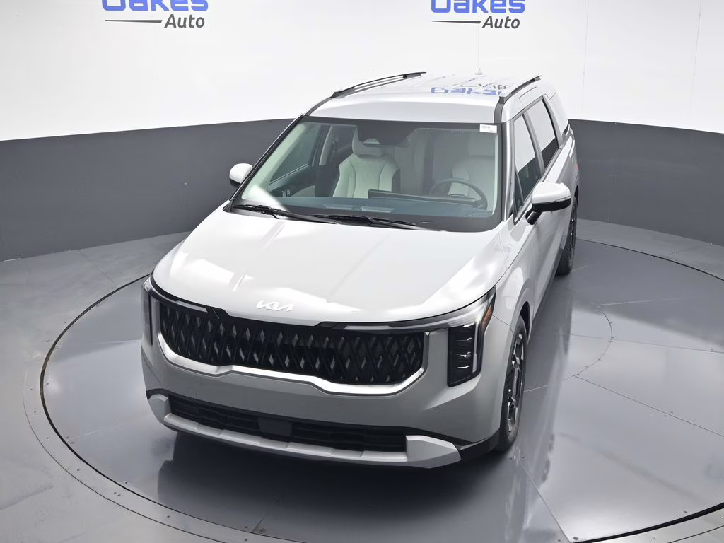 2026 Ceramic Silver Kia Carnival EX FWD Van