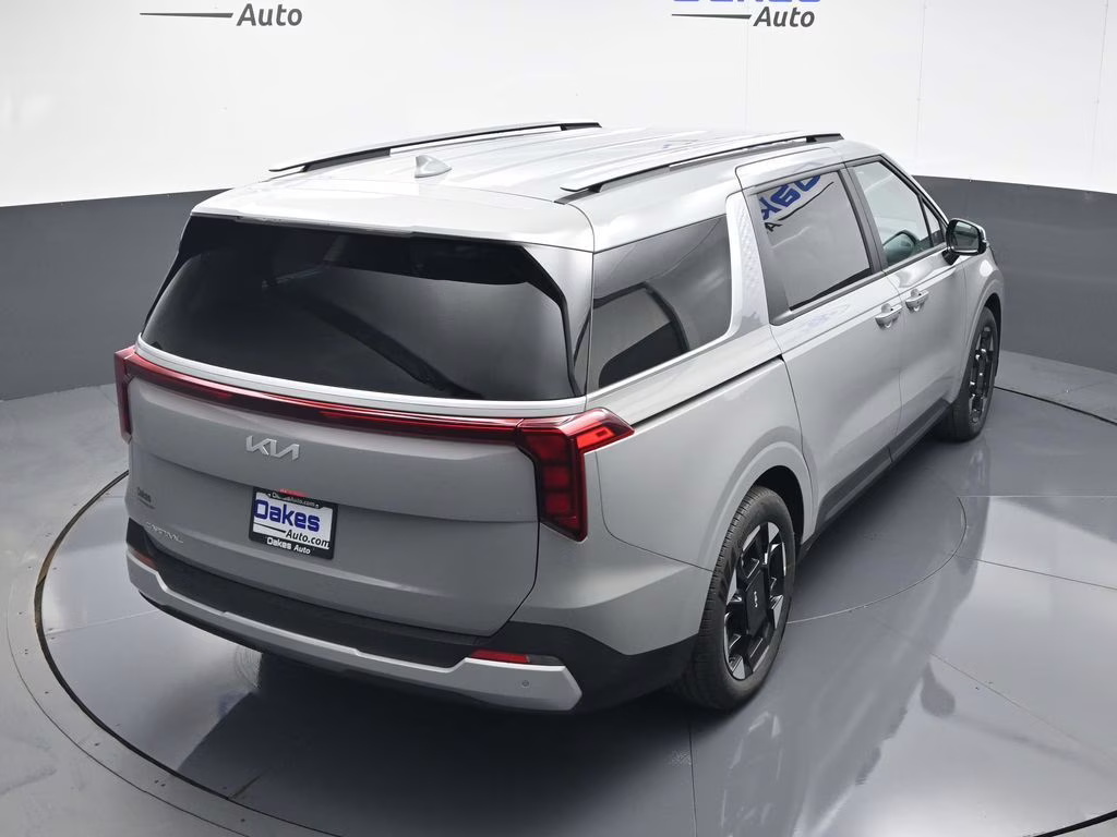 2026 Ceramic Silver Kia Carnival EX FWD Van