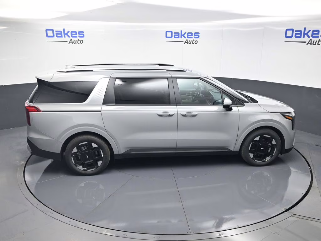 2026 Ceramic Silver Kia Carnival EX FWD Van