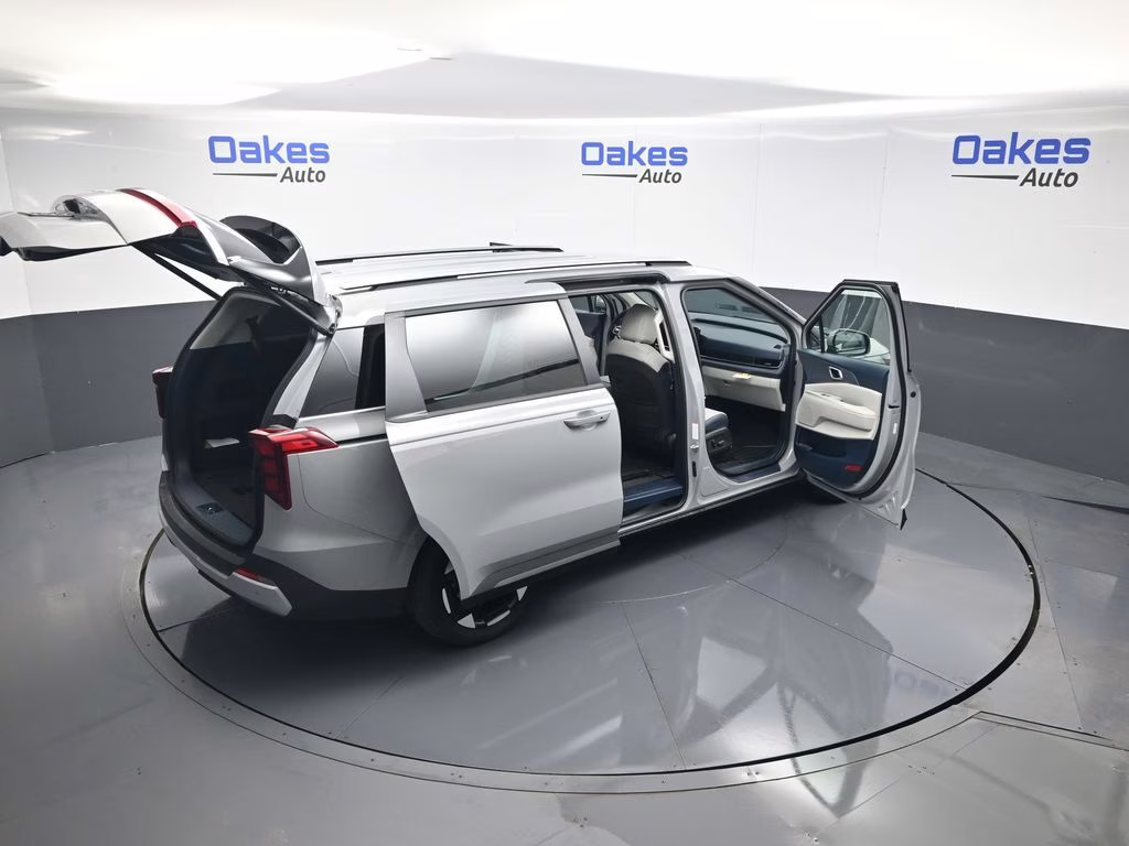 2026 Ceramic Silver Kia Carnival EX FWD Van