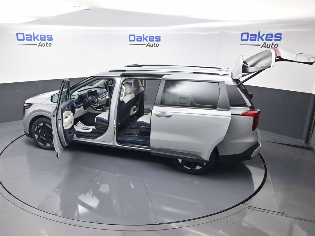 2026 Ceramic Silver Kia Carnival EX FWD Van