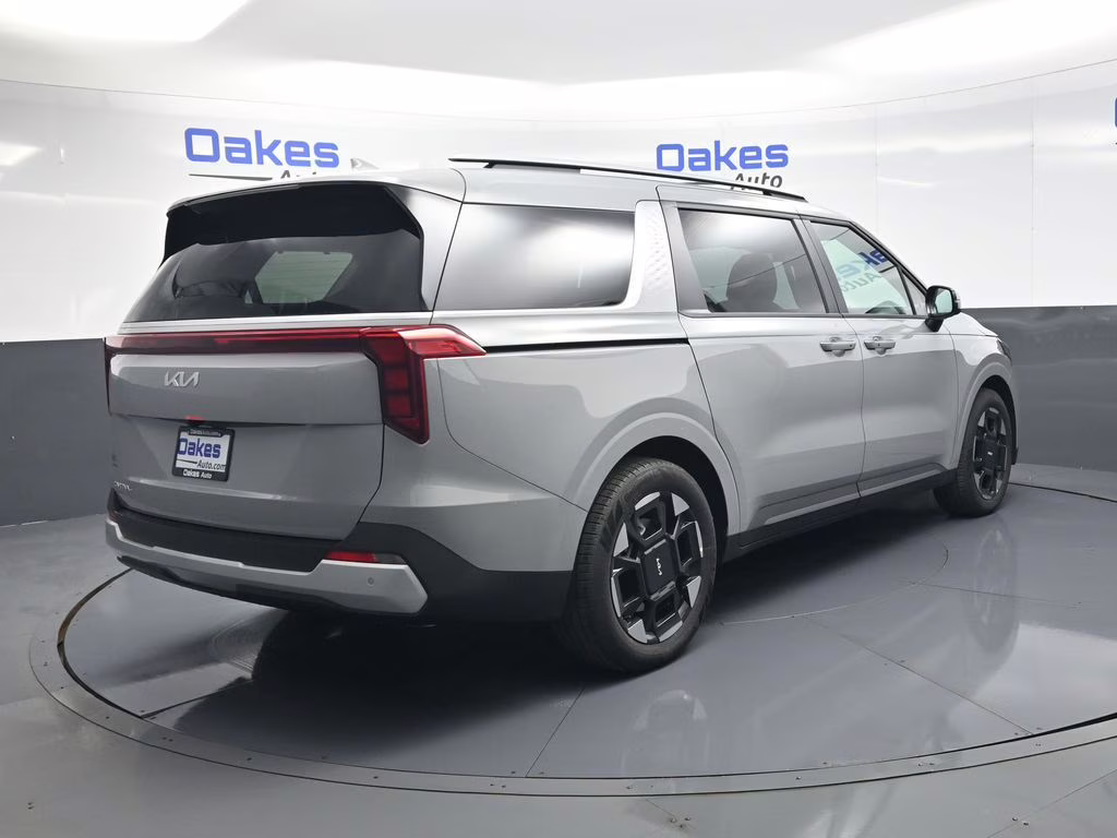 2026 Ceramic Silver Kia Carnival EX FWD Van