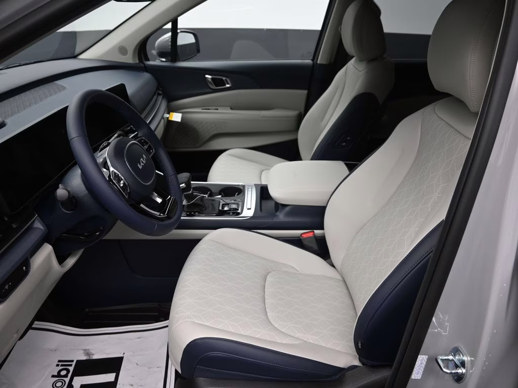 2026 Ceramic Silver Kia Carnival EX FWD Van