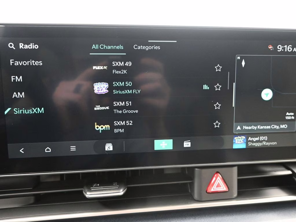 2026 Ceramic Silver Kia Carnival EX FWD Van