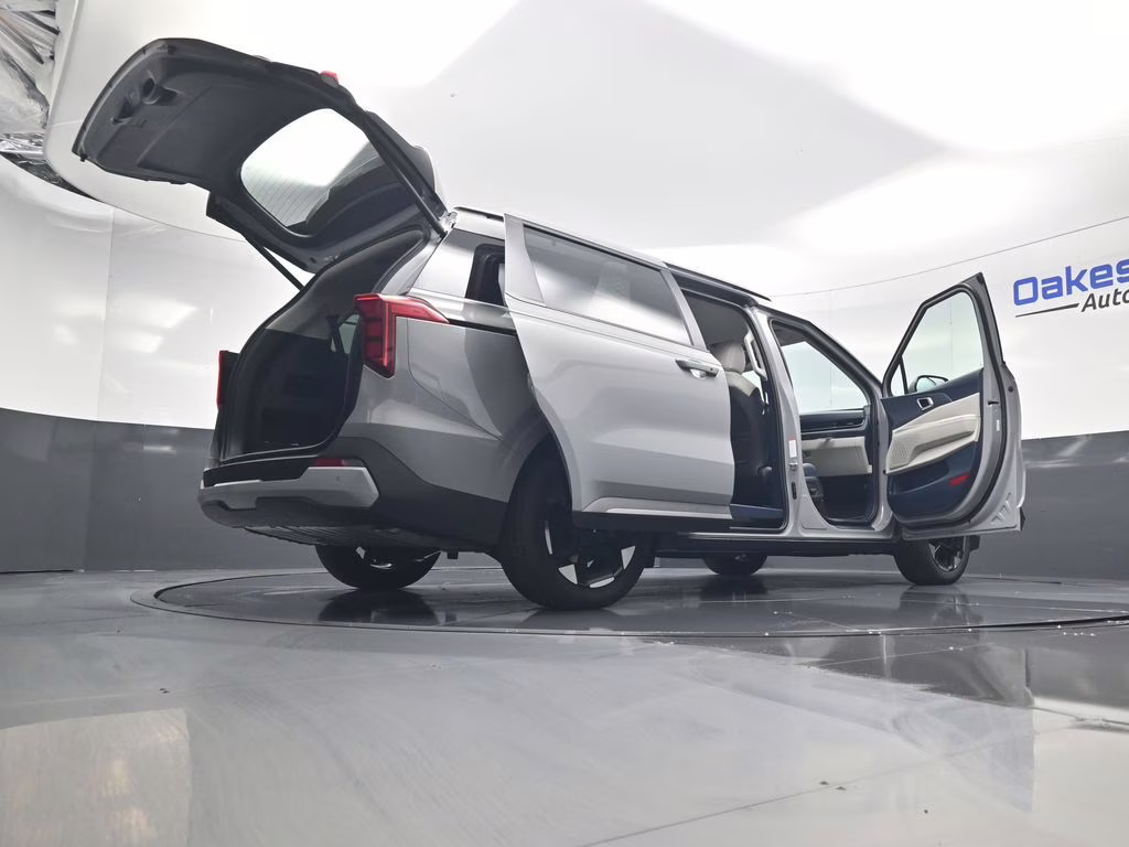 2026 Ceramic Silver Kia Carnival EX FWD Van