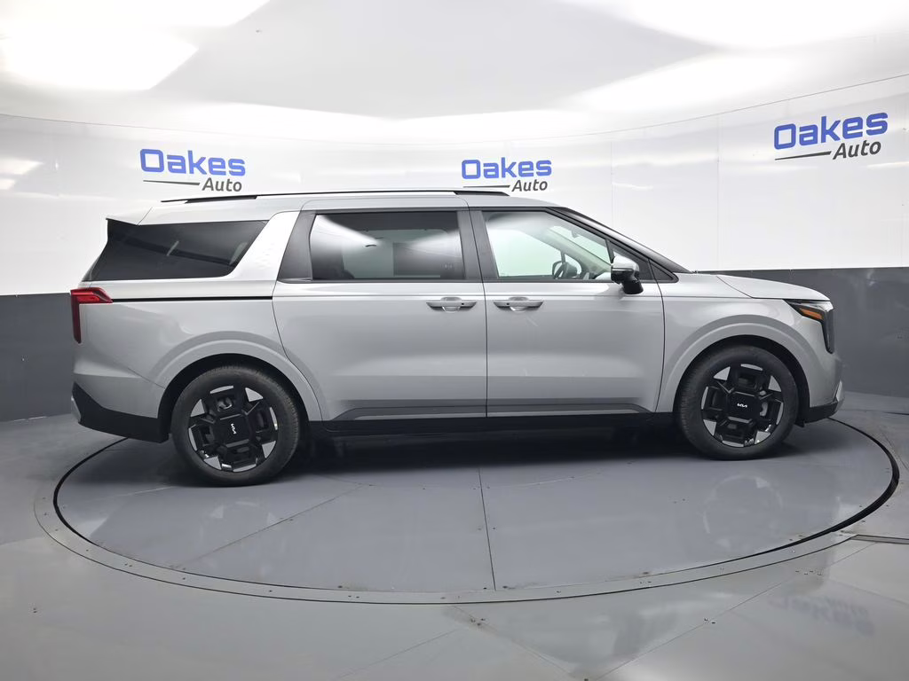 2026 Ceramic Silver Kia Carnival EX FWD Van